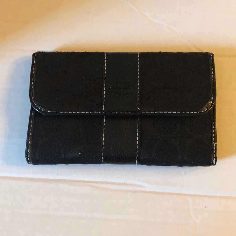 Slightly used black Coach wallet.